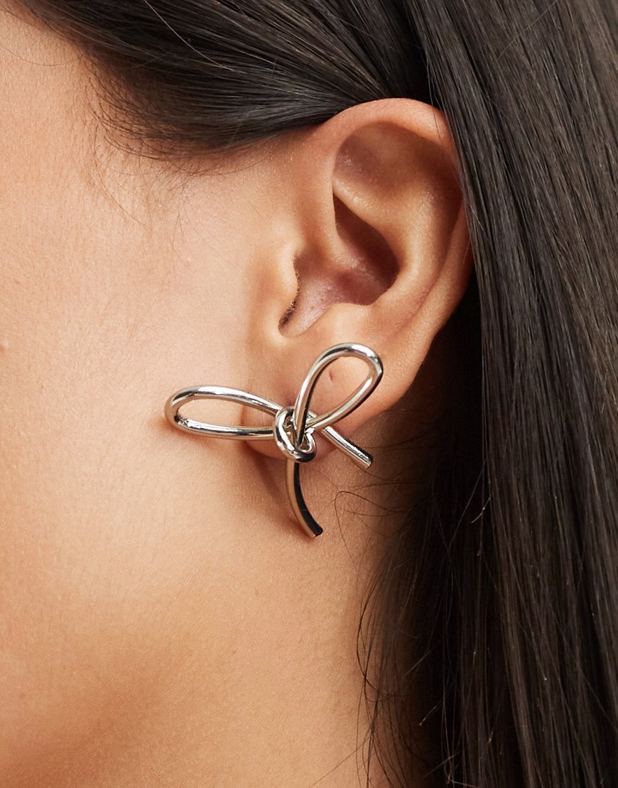 skinny silver bow earrings