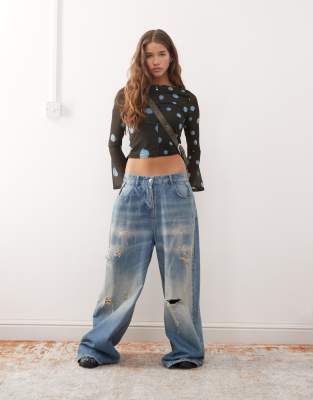 Reclaimed Vintage Slash Neck Flare Sleeves Top With Spliced Blurred Polka Dot Print In Black