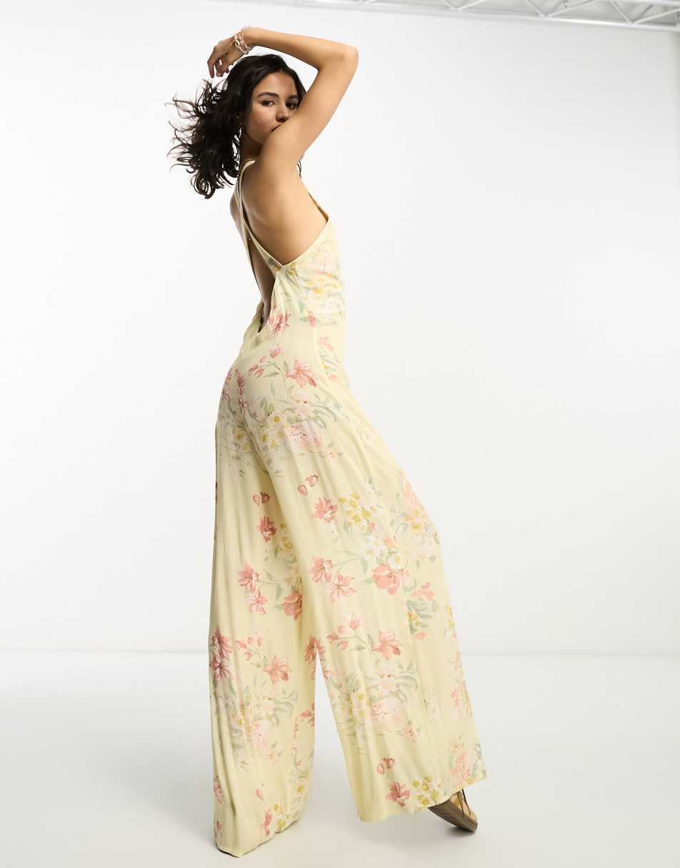 Reclaimed Vintage sleeveless jumpsuit in creamy floral