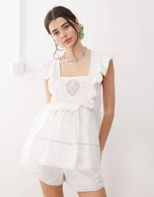 Reclaimed Vintage Sleeveless Smock Top With Embroidery In White
