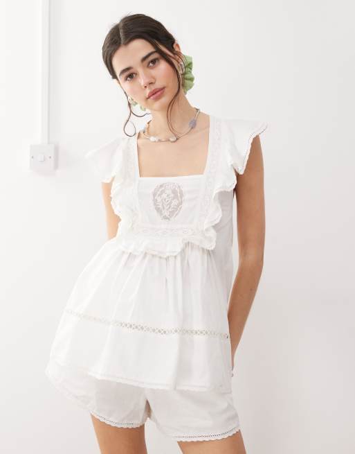 Reclaimed Vintage sleevless smock top coord with lace embroidery in white