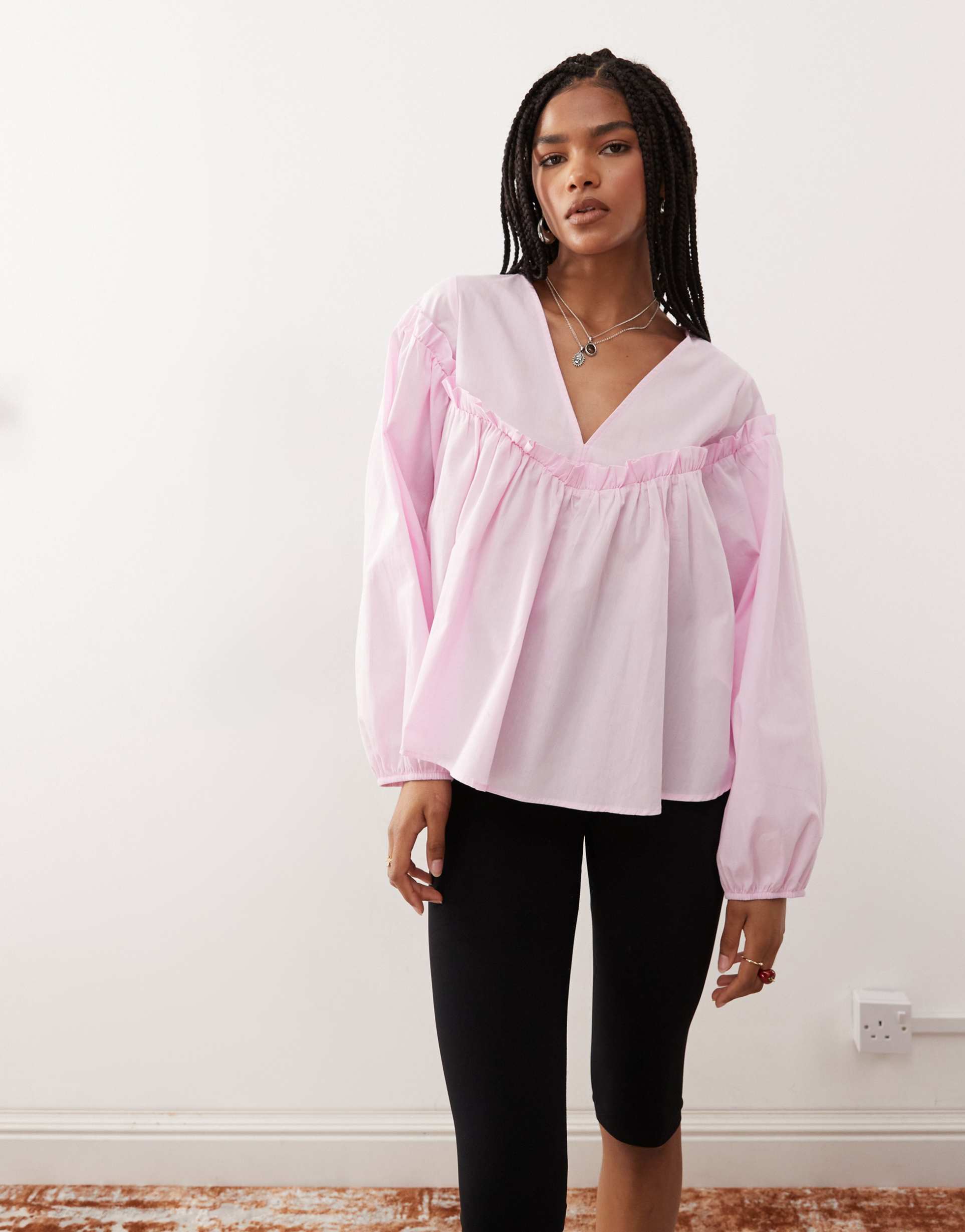 reclaimed vintage smock top with v neck and ruffle details in baby pink