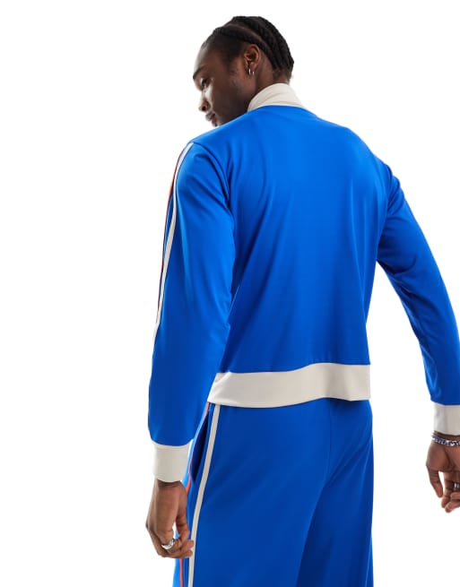 Reclaimed Vintage sports track jacket co ord with stripes and funnel neck in blue ASOS
