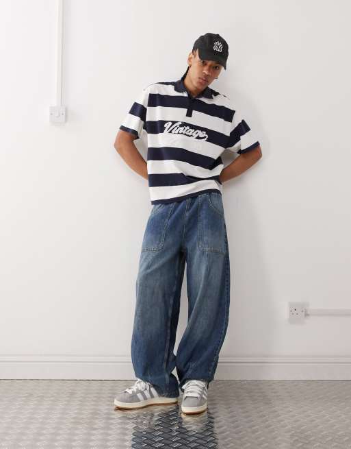 Reclaimed Vintage striped pique polo shirt with graphic in navy