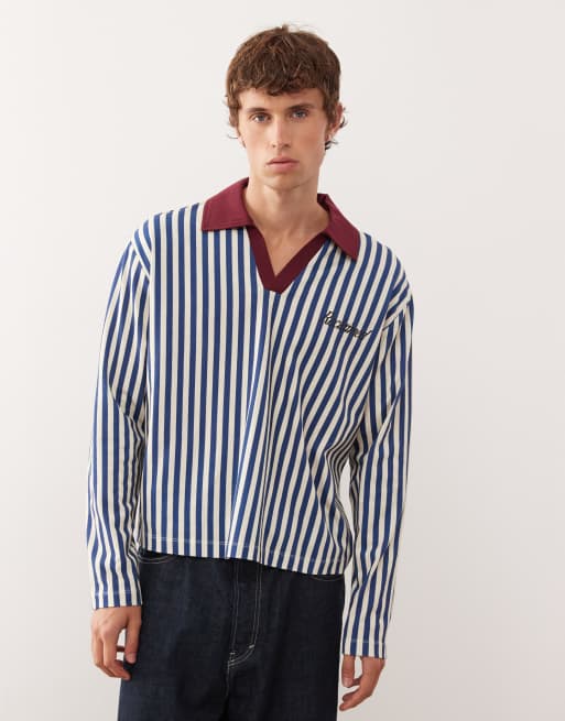 Reclaimed Vintage striped soccer polo in blue and white with branding graphic