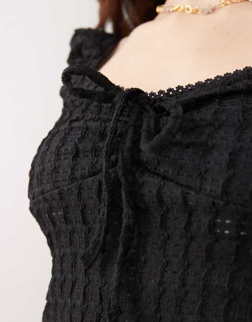 Reclaimed Vintage – Strukturiertes Oberteil aus Jersey in Schwarz mit Milchmädchen-Design, 3 von 4
