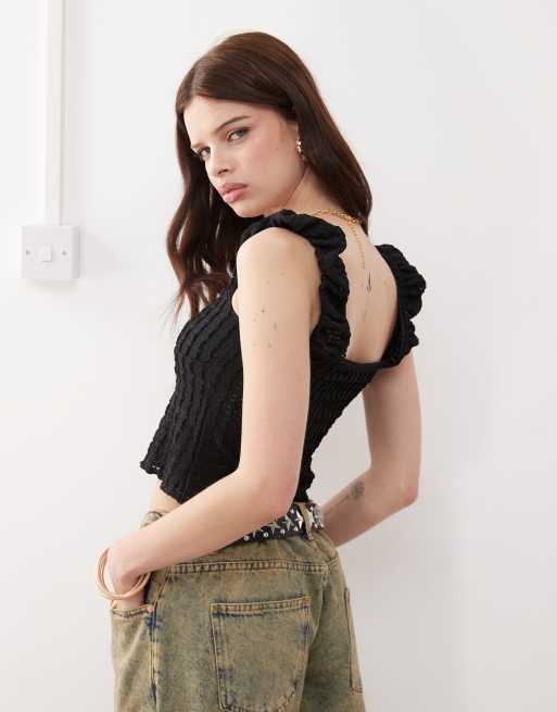 Reclaimed Vintage – Svart topp i milkmaid-modell av texturerad jersey, 4 av 4