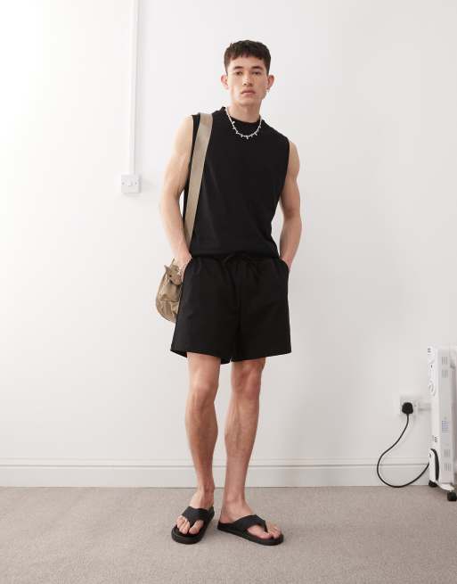 Reclaimed Vintage – Svarta jersey-shorts i kortare längd, 3 av 5