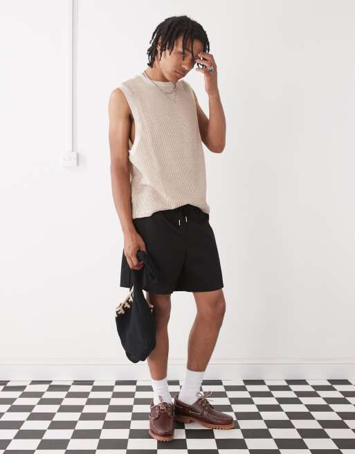 Reclaimed Vintage – Svarta, korta chino-shorts med baggy-passform och elastisk midja