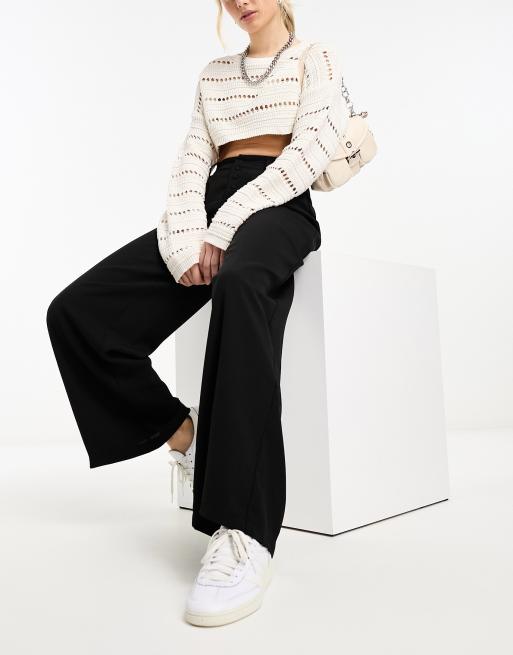 Reclaimed Vintage – Svarta vida byxor i 90-talsstil