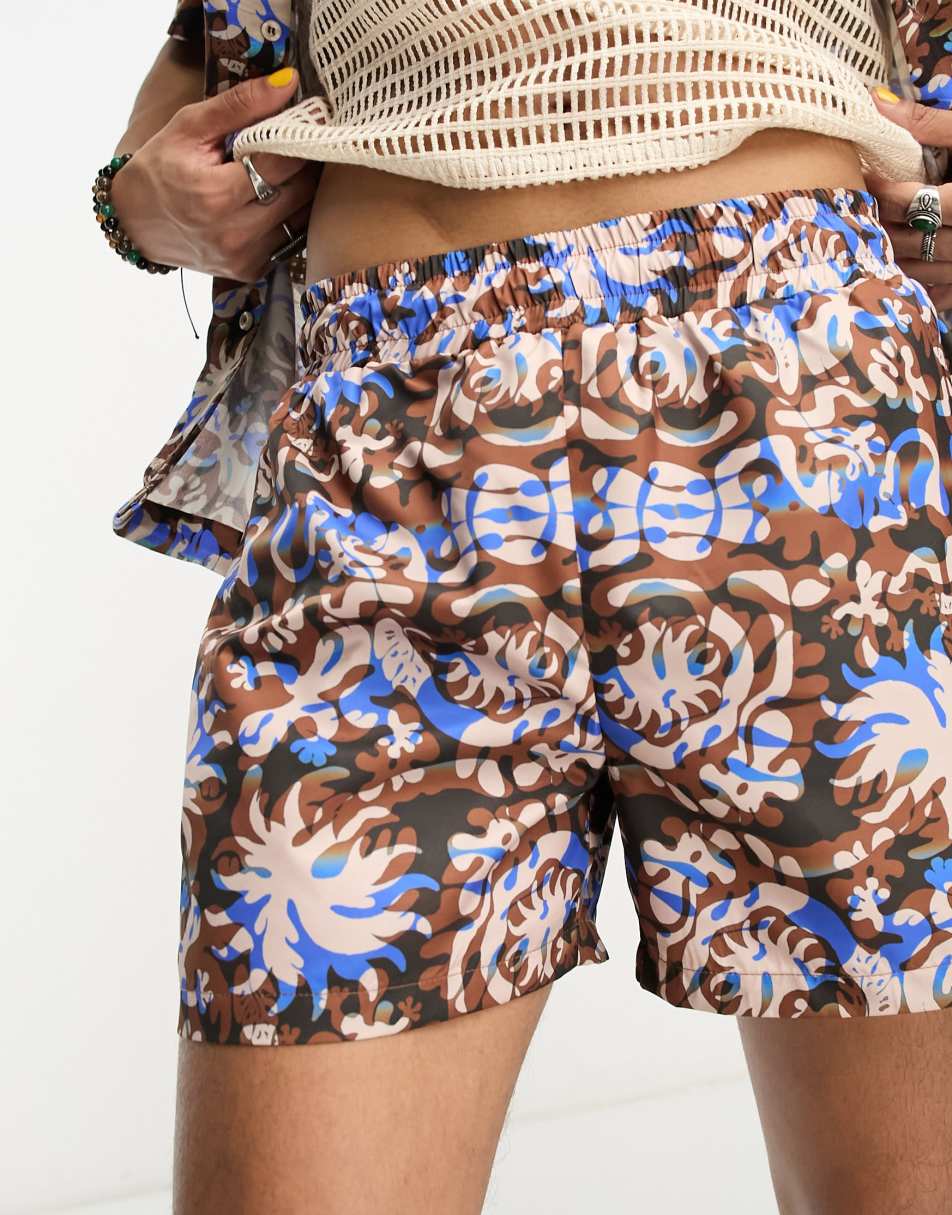 Reclaimed Vintage swim short in 90s celestial print 0