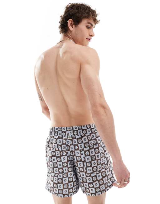 Reclaimed Vintage swim shorts in blue floral tile print ASOS