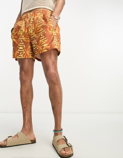 Reclaimed Vintage swim shorts in brown pattern geo print