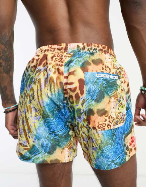 Reclaimed Vintage swim shorts in leopard print ASOS