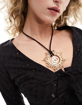 Reclaimed Vintage swirl pendant necklace on cord - ASOS Price Checker