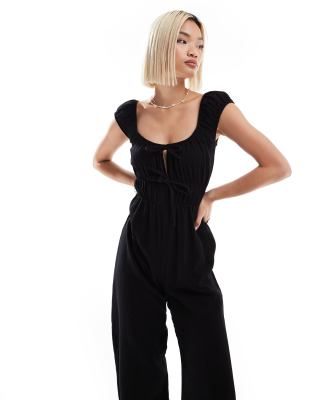 textured tie front jumpsuit in black