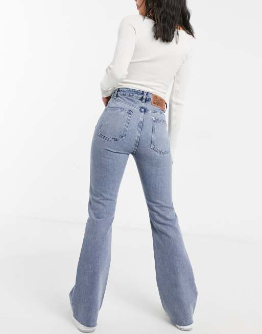 Reclaimed Vintage The 99 flare jean in mid blue wash ASOS