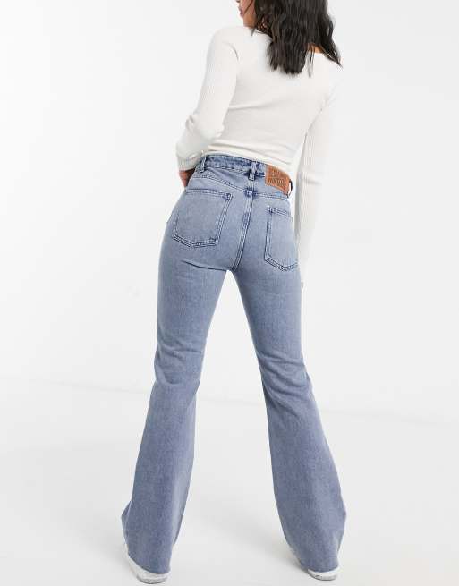 Reclaimed Vintage The 99 Flare Jean In Mid Blue Wash Asos