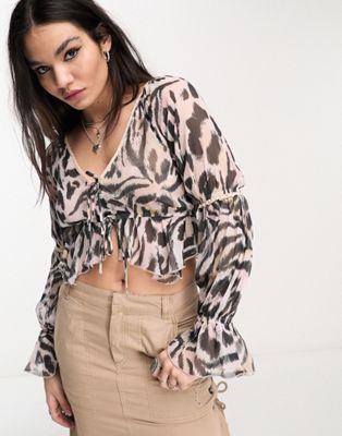 Reclaimed Vintage tie front blouse in animal print - ASOS Price Checker
