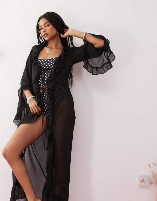 Reclaimed Vintage tie front sheer beach top with ruffles in black