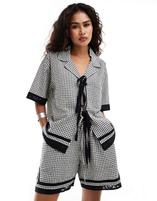 Reclaimed Vintage tie front shirt with bows in black and white gingham