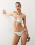 [Reclaimed Vintage] Reclaimed Vintage tie side bikini bottoms with floral towelling detail in pastel green 8 Mint