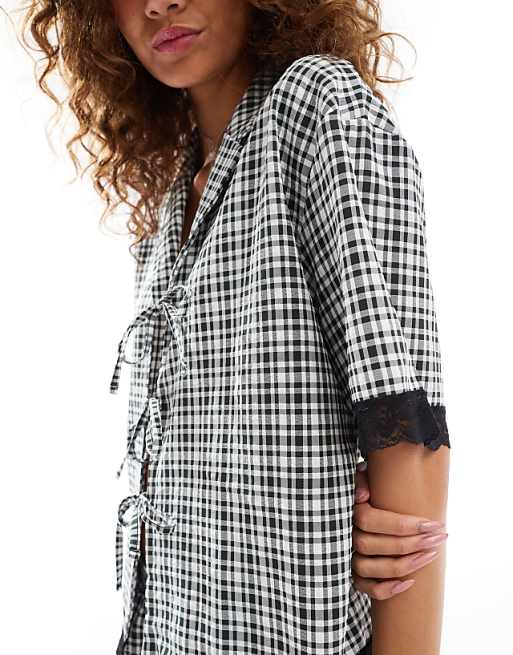 Reclaimed Vintage tie up gingham shirt with lace trim | ASOS Reclaimed Vintage tie up gingham shirt with lace trim | ASOS