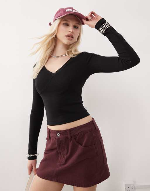 Reclaimed Vintage - Top a maniche lunghe con finiture in pizzo nero con scollo a V 