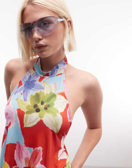 Reclaimed Vintage - Top allacciato al collo con schiena scoperta blu a fiori