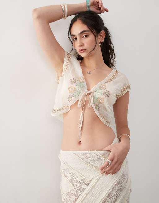 Reclaimed Vintage - Top da spiaggia trasparente allacciato sul davanti con paillettes e ricami