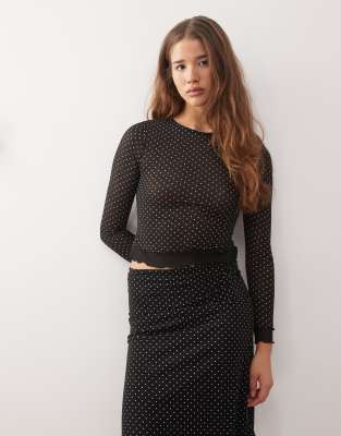 Top manches longues avec bordure contrastée et pois-Noir XS