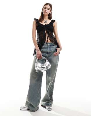 Reclaimed Vintage – Tunika-Oberteil in Schwarz mit Babydoll-Design