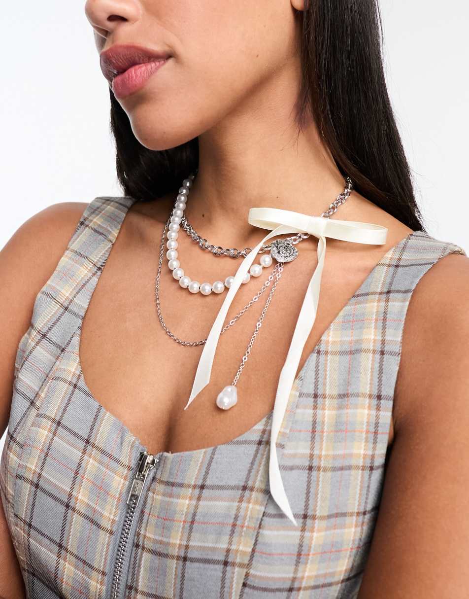 Reclaimed Vintage twisty mash up necklace with bow