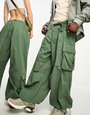 Reclaimed Vintage unisex baggy tech parachute cargos in khaki-Green