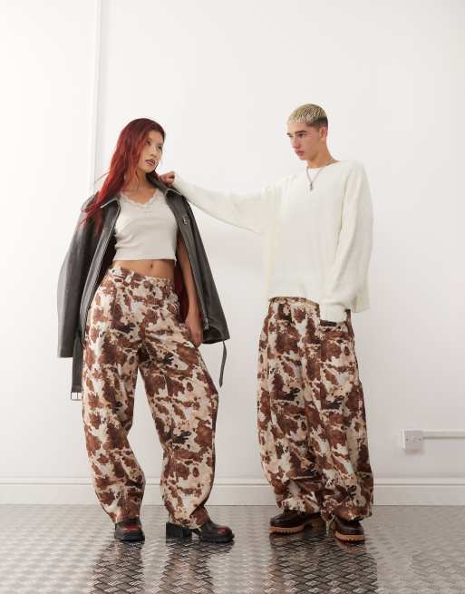 Reclaimed Vintage - Unisex broek met koeienprint en wijde pijpen