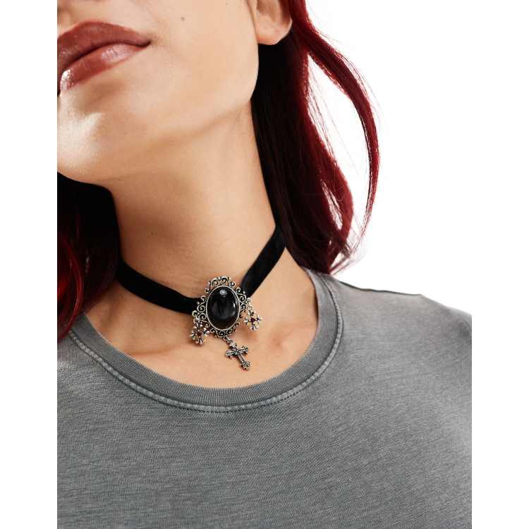 Reclaimed Vintage unisex choker with stone and cross in black velvet ASOS
