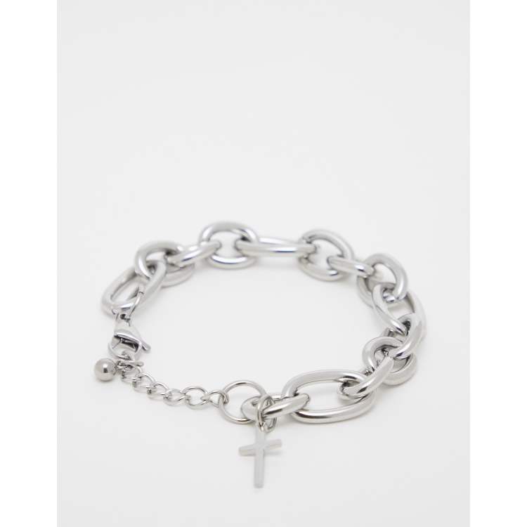 Silver bracelet store with cross charm