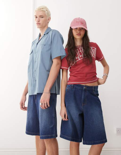 Reclaimed Vintage unisex denim skate shorts in denim blue wash