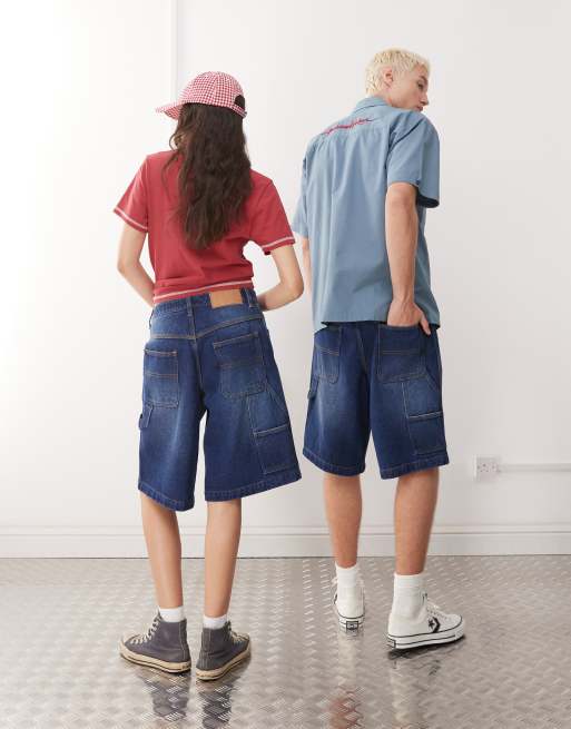 Reclaimed Vintage unisex denim skate shorts in denim blue wash