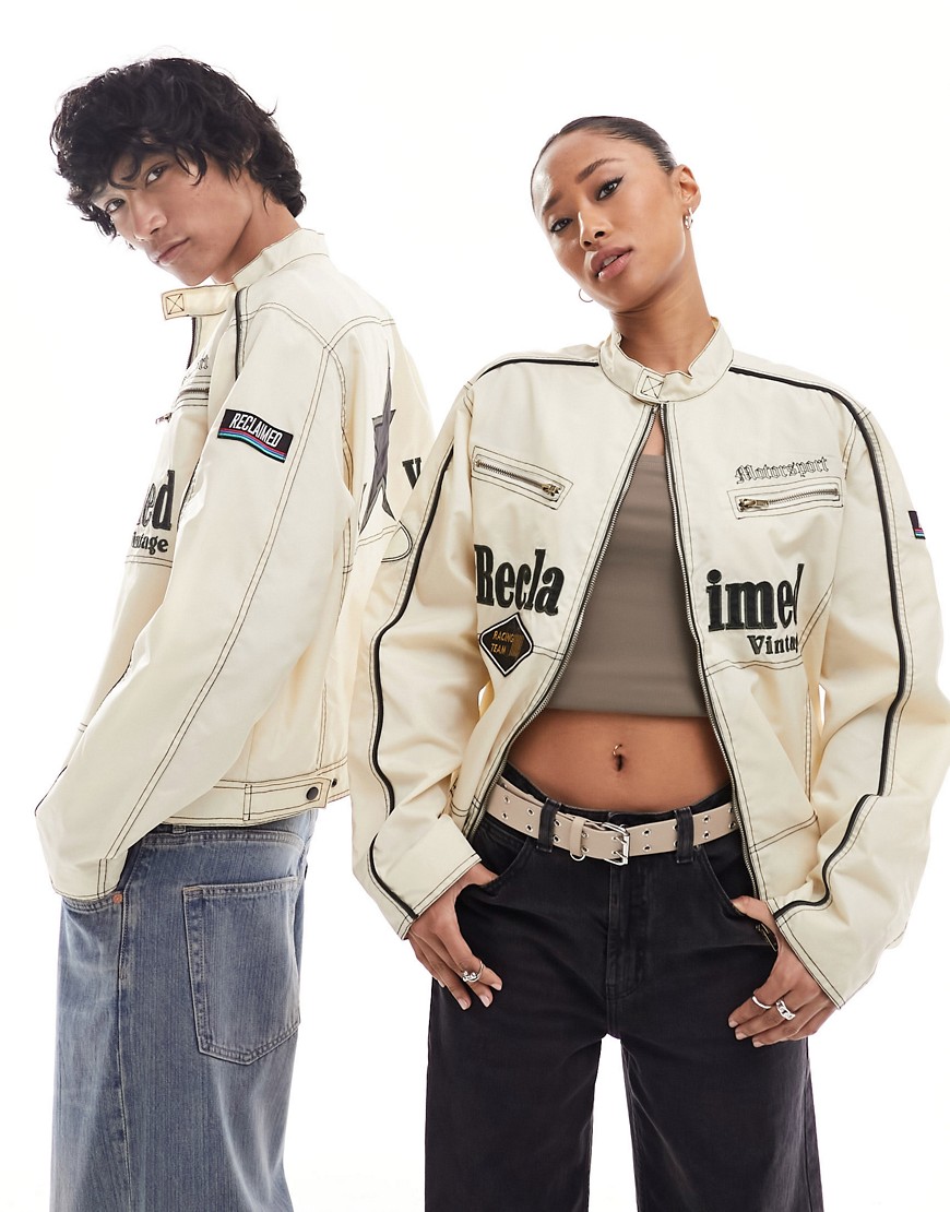 unisex fitted moto jacket in off white with logo badges and embroidery