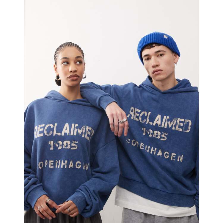 Reclaimed Vintage unisex graphic print hoodie in washed navy | ASOS