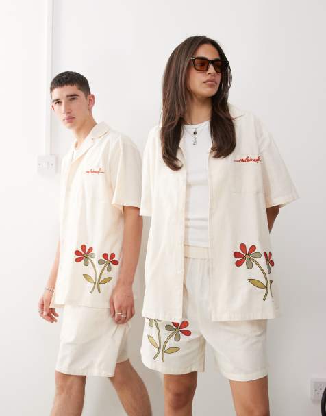 Reclaimed Vintage unisex short sleeve shirt with logo and flower print in ecru