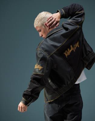 Reclaimed Vintage unisex leather look and cord mix bomber with branding