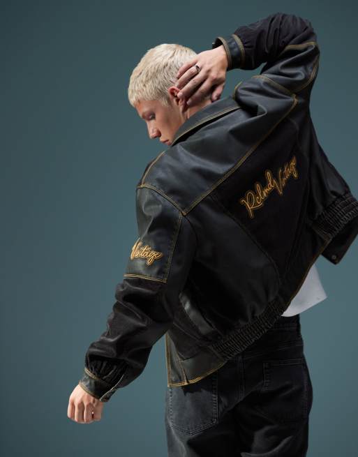 Reclaimed Vintage unisex leather look and cord mix bomber with branding ASOS
