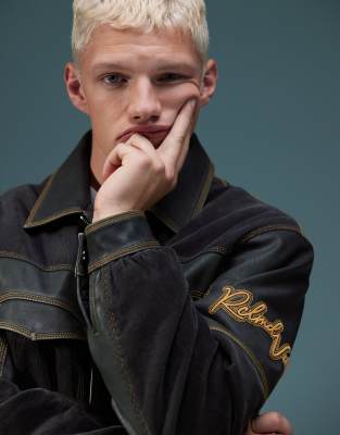 Reclaimed Vintage unisex leather look and cord mix bomber with branding