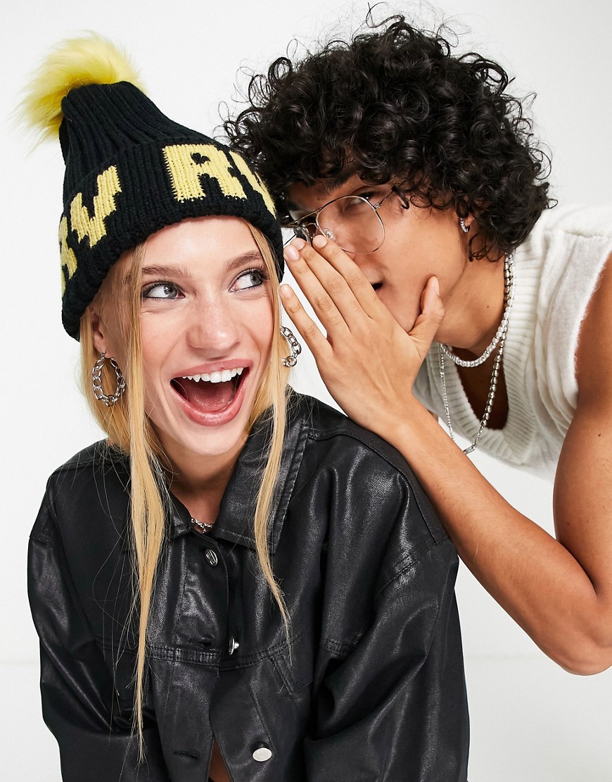 unisex logo beanie hat with faux fur pom pom in black and yellow