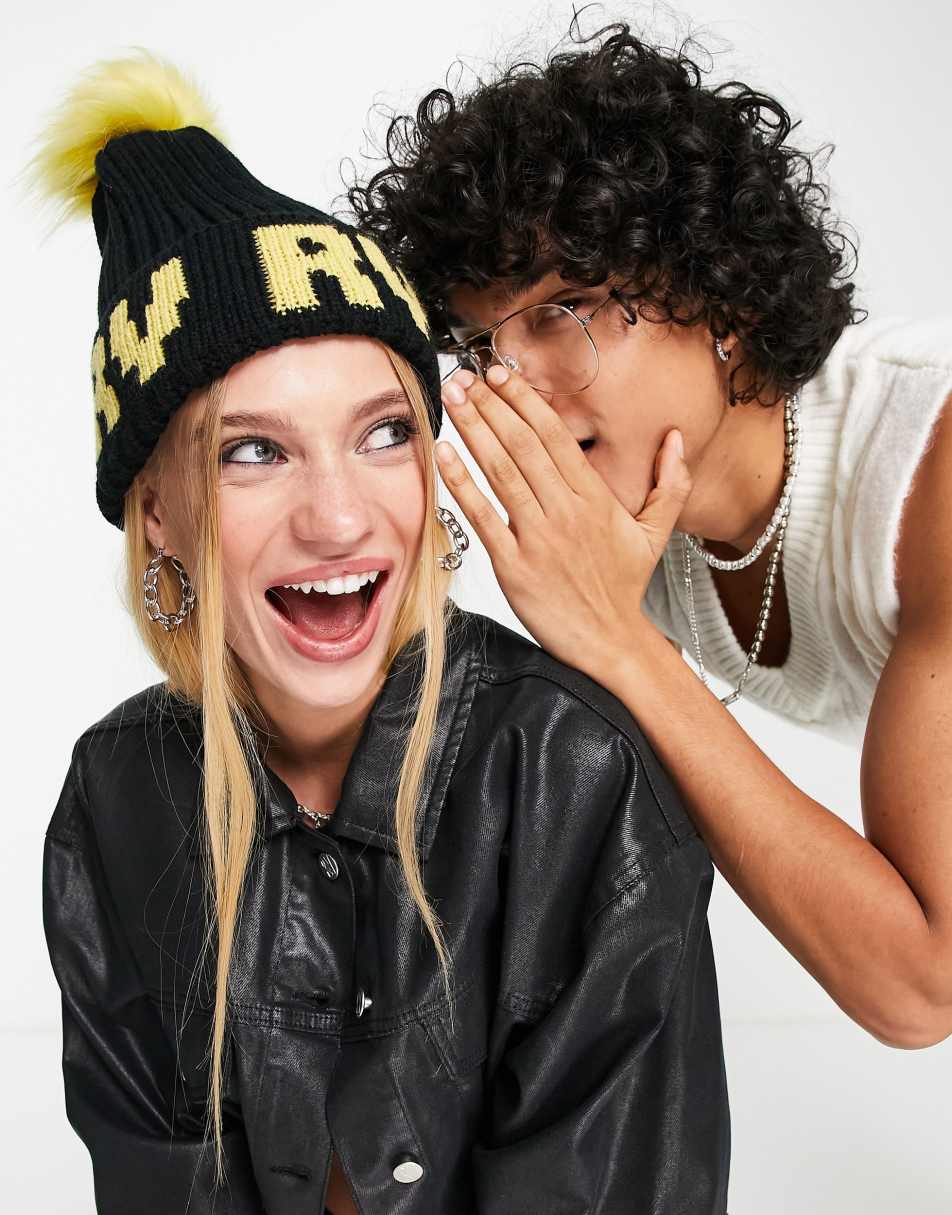Reclaimed Vintage unisex logo beanie hat with faux fur pom pom in black and yellow