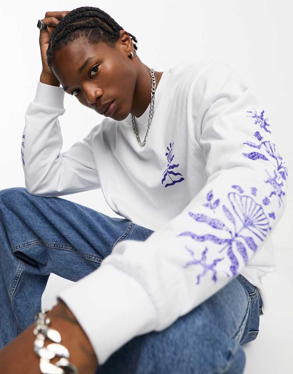 Reclaimed Vintage unisex long sleeve skate tee with floral graphic in white 1