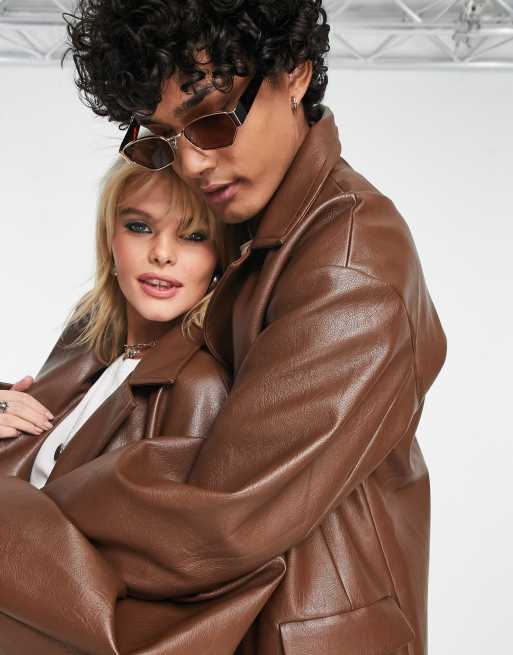 Reclaimed Vintage unisex longline leather look jacket in tan