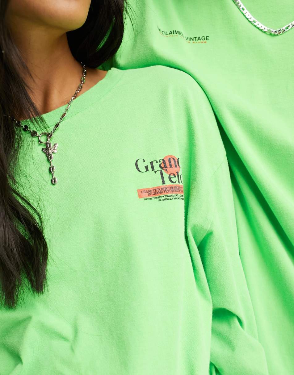 Reclaimed Vintage unisex mountain back print long sleeve t-shirt in green 1